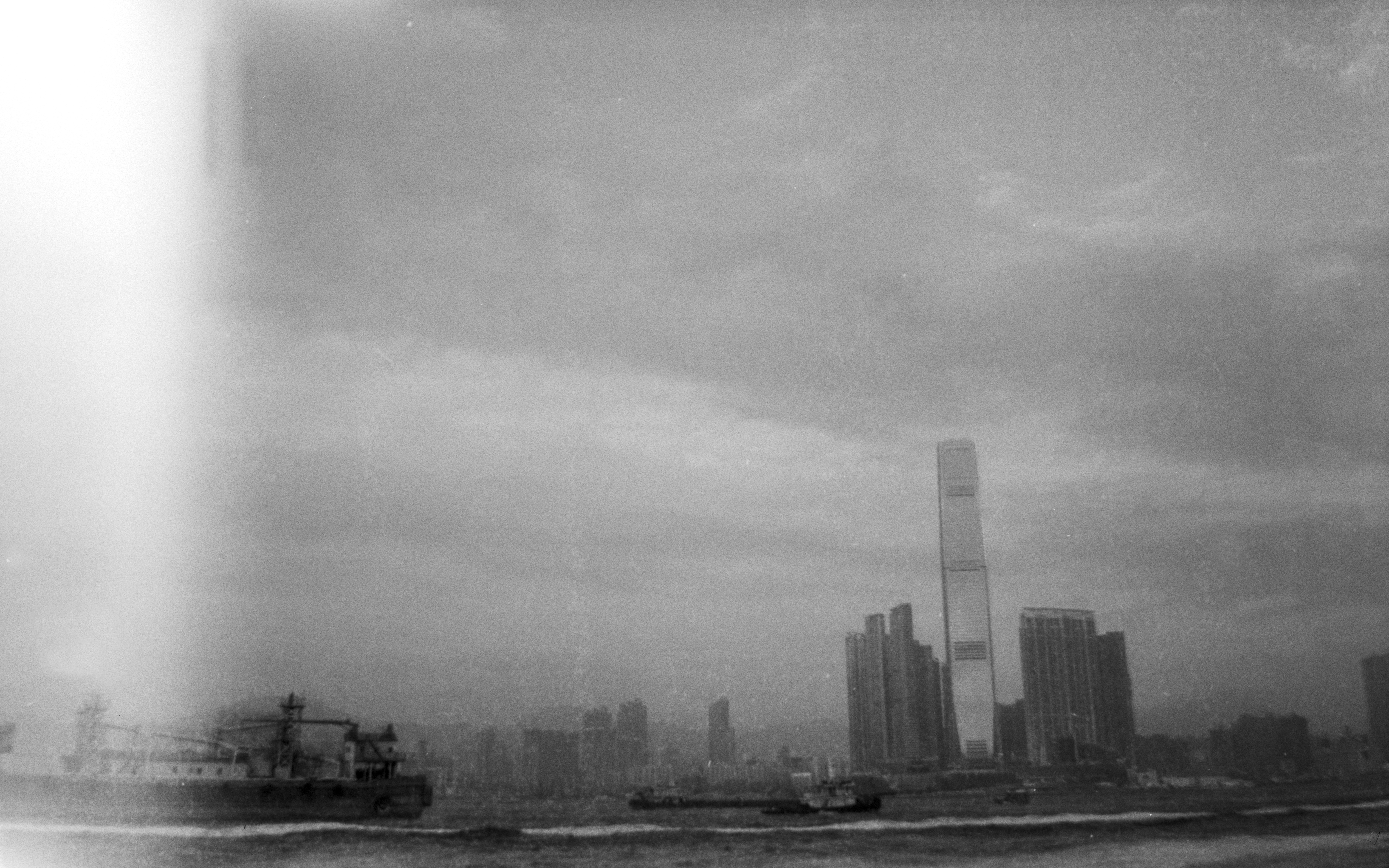 Black and white shot of the Victoria Harbour, by Urania Chiu
